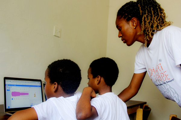 Kids learning coding at Smartribe